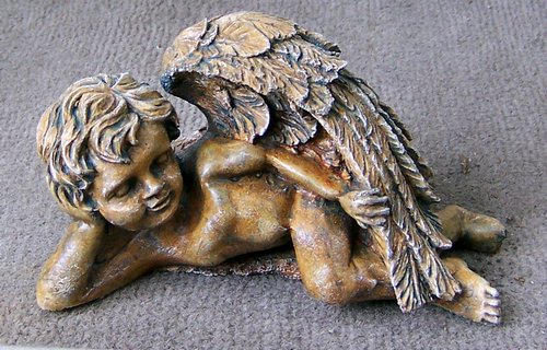 M093 Small Laying Angel 7 in. L x 4 in.H.JPG